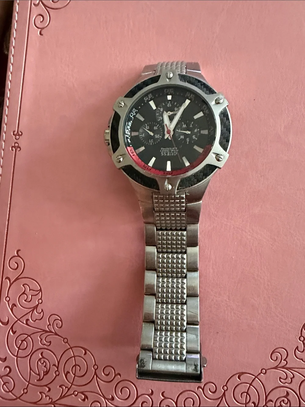 Watch on pink background